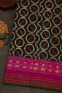 Pochampally Ikat Silk Black Saree With Floral And Leaf Lines Border