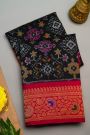 Gadwal Silk Black Saree With Florals And Leaves In Ikat Print Body
