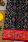 Gadwal Silk Black Saree With Florals And Leaves In Ikat Print Body