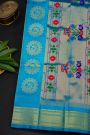 Gadwal Silk Sky Blue Saree With Florals And Peacocks In Zari Body