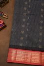 Kuppadam Sico Dark Grey Saree With Florals And Peacock Buttis Body