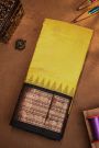 Kuppadam Sico Yellow Saree With Florals And Paisley Buttis Body