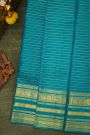 Kancheepuram Silk Peacock Blue Saree With Florals And Peacocks Border