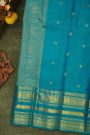 Kancheepuram Silk Peacock Blue Saree With Florals And Peacocks Border