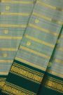Kancheepuram Silk Sea Green Saree With Zari Lines And Peacock Buttis Body