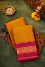 Kancheepuram Silk Mustard Yellow Saree With Zari Checks Florals And Peacock Buttis Body