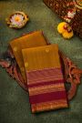 Kancheepuram Silk Mustard Yellow Saree With Zari Lines And Peacocks Buttis Body