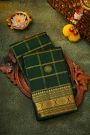 Kancheepuram Silk Bottle Green Saree With Florals And Buttis Border
