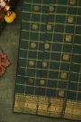 Kancheepuram Silk Bottle Green Saree With Florals And Buttis Border