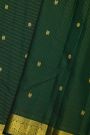 Kancheepuram Silk Bottle Green Saree With Zari Lines Checks Florals And Peacock Buttis Body