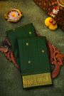 Kancheepuram Silk Bottle Green Saree With Zari Lines And Floral Peacock Buttis Body