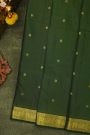 Kancheepuram Silk Bottle Green Saree With Zari Lines And Floral Peacock Buttis Body