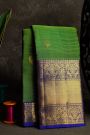 Kancheepuram Silk Leaf Green Saree With Florals And Peacock Border