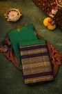 Kancheepuram Silk Bottle Green Saree With Florals And Gandaberunda Buttis Body
