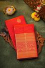 Kancheepuram Silk Red Saree With Zari Checks And Peacock Buttis Body