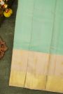 Kancheepuram Silk Sea Green Saree With Floral And Peacock Border