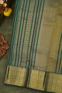 Kancheepuram Silk Bottle Green Saree With Zari Lines And Peacocks Border