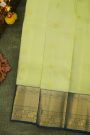 Kancheepuram Silk Lime Green Saree With Floral Leaf And Pichwai Border