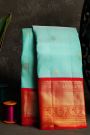 Kancheepuram Silk Sky Blue Saree With Rudraksha Buttis Body And Traditional Border
