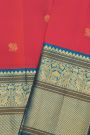 Kancheepuram Silk Coral Saree With Florals And Peacock Buttis Body