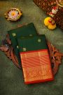 Kancheepuram Silk Bottle Green Saree With Florals And Peacocks Buttis Body