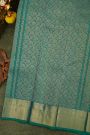 Kancheepuram Silk Sea Blue Saree With Florals And Peacocks In Checks Body