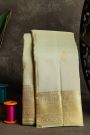 Kancheepuram Silk Off White Saree With Zari Buttis And Peacocks Border