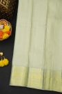 Kancheepuram Silk Mint Green Saree With Florals And Peacocks Border