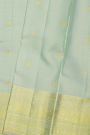 Kancheepuram Silk Mint Green Saree With Florals And Peacocks Border
