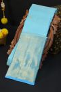Kancheepuram Silk Sky Blue Saree With Zari Checks Florals And Peacocks Border