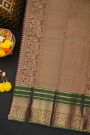 Kancheepuram Silk Dark Brown Saree With Florals And Peacock Buttis Body