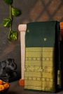 Kancheepuram Silk Dark Green Saree With Florals And Peacock Buttis Body