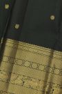 Kancheepuram Silk Dark Green Saree With Florals And Peacock Buttis Body