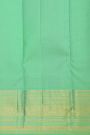 Kancheepuram Silk Sea Green Saree With Florals And Peacock Buttis Body