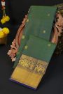 Kancheepuram Silk Peacock Green Saree With Zari Lines And Floral Buttis Body