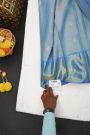 Kancheepuram Silk Ice Blue Saree With Florals And Peacocks Border