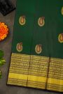 Kancheepuram Silk Bottle Green Saree With Florals And Paisley In Meena Buttis Body