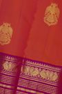 Kancheepuram Silk Orange Saree With Florals And Peacocks Buttis Border