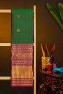 Kancheepuram Silk Bottle Green Saree With Peacocks And Elephants In Zari Body And Traditional Border
