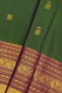 Kancheepuram Silk Bottle Green Saree With Peacocks And Elephants In Zari Body And Traditional Border