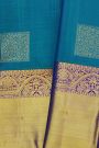 Kancheepuram Silk Peacock Blue Saree With Florals And Leaves Body And Kaddi Border