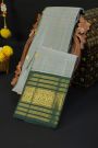 Kancheepuram Silk Grey Saree With Floral And Peacock Buttis Body