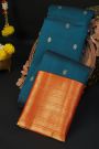 Kancheepuram Silk Peacock Blue Saree With Florals And Peacocks Buttis Body