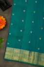 Kancheepuram Silk Teal Green Saree With Florals Peacocks And Yalli Border