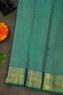 Kancheepuram Silk Teal Green Saree With Florals Peacocks And Yalli Border