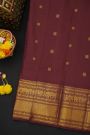 Kancheepuram Silk Wine Saree With Florals And Peacocks Buttis Body