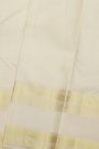 Kancheepuram Silk Off White Saree With Checks And Floral Buttis Body