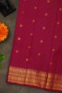 Kancheepuram Silk Magenta Saree With Zari Checks Floral And Peacock Buttis Body