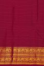Kancheepuram Silk Magenta Saree With Zari Checks Floral And Peacock Buttis Body