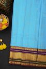 Kancheepuram Silk Sky Blue Saree With Cross Lines And Florals Kuttu Border